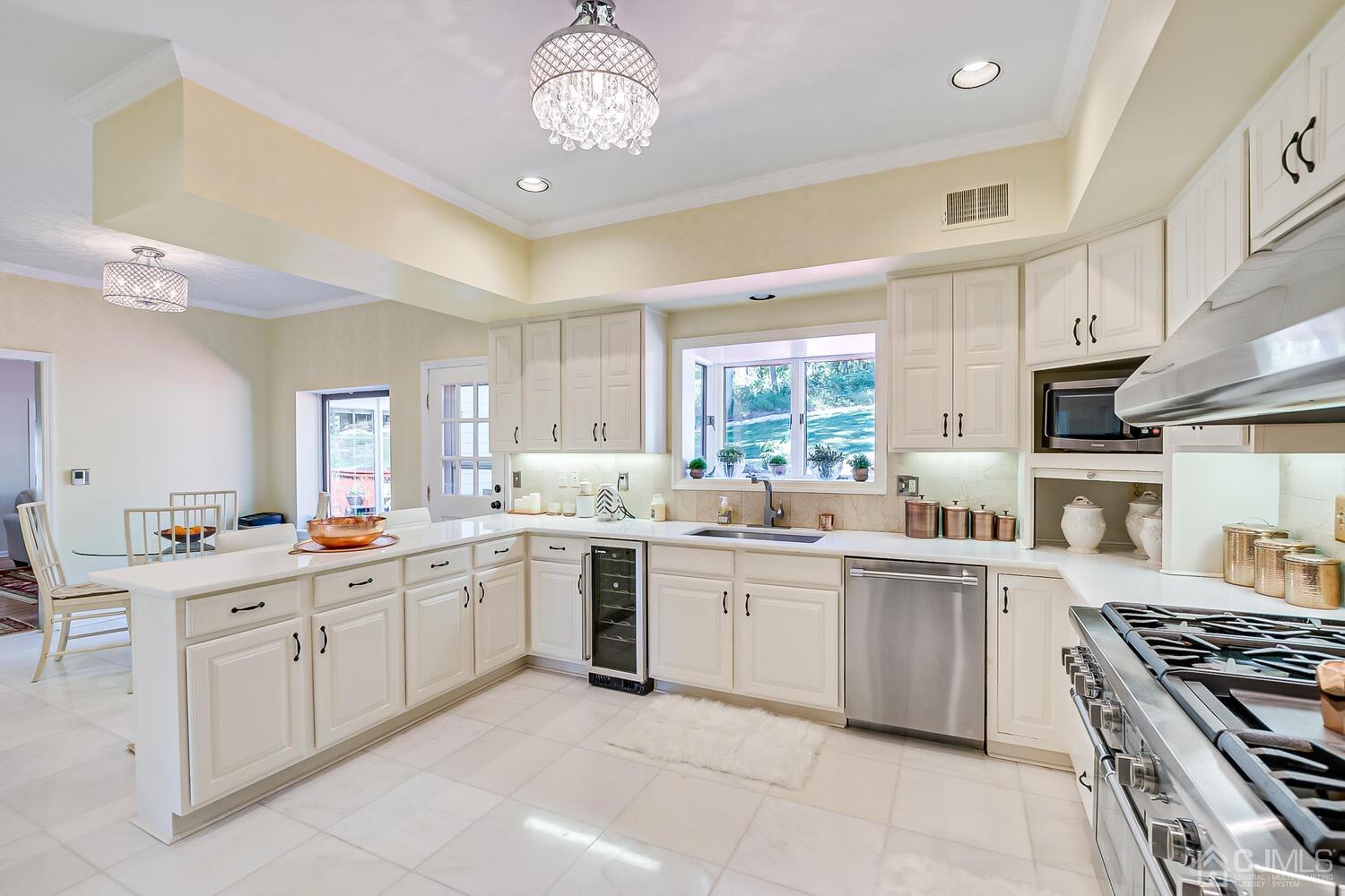39 Martinsville Road Bernards, NJ 07920 - Photo 26 of 65 a kitchen with a sink stove and cabinets