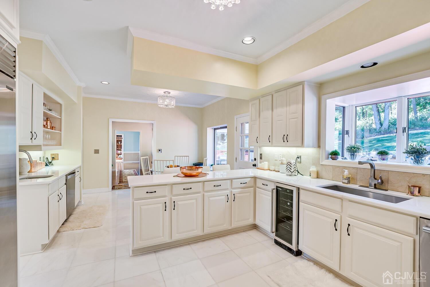 39 Martinsville Road Bernards, NJ 07920 - Photo 27 of 65 a kitchen that has a sink and a stove in it