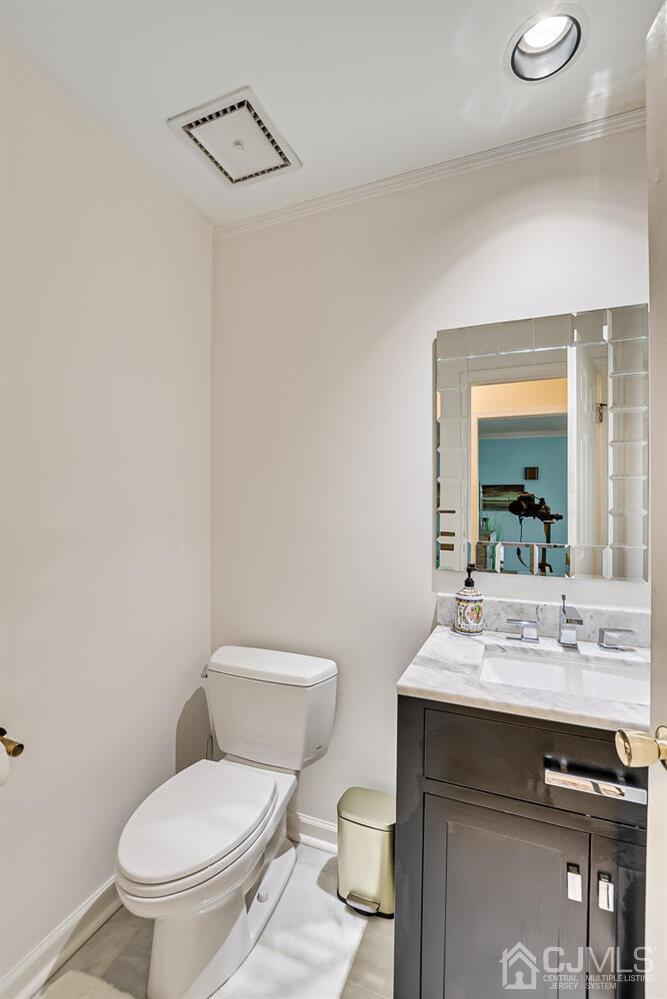 39 Martinsville Road Bernards, NJ 07920 - Photo 32 of 65 a bathroom with a granite countertop toilet sink and mirror