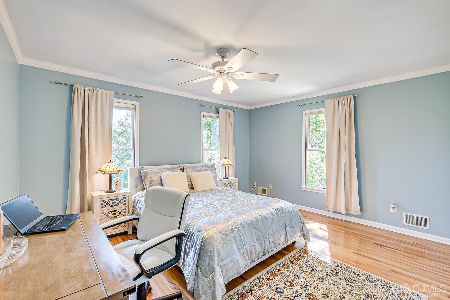 39 Martinsville Road Bernards, NJ 07920 - Photo 45 of 65 a spacious bedroom with a bed and a window