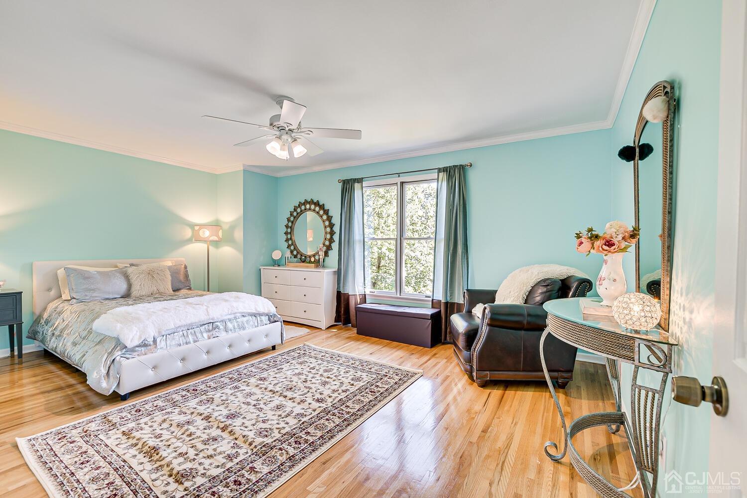 39 Martinsville Road Bernards, NJ 07920 - Photo 47 of 65 a bedroom with a bed and a chandelier