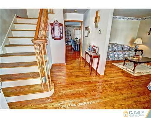 126 North Hill Road Colonia, NJ 07067 - Photo 2 of 25 a view of entryway and hall with wooden floor