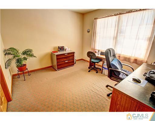 126 North Hill Road Colonia, NJ 07067 - Photo 19 of 25 a room with furniture and a window