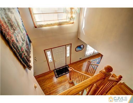 126 North Hill Road Colonia, NJ 07067 - Photo 3 of 25 a view of an entryway with wooden floor