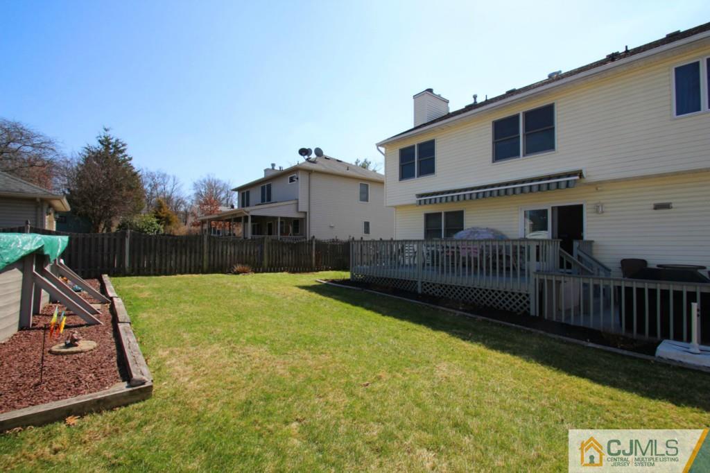 126 North Hill Road Colonia, NJ 07067 - Photo 25 of 25 a view of a house with backyard and porch