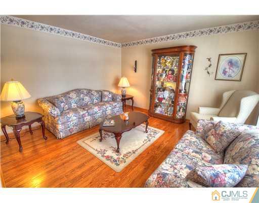 126 North Hill Road Colonia, NJ 07067 - Photo 6 of 25 a living room with furniture