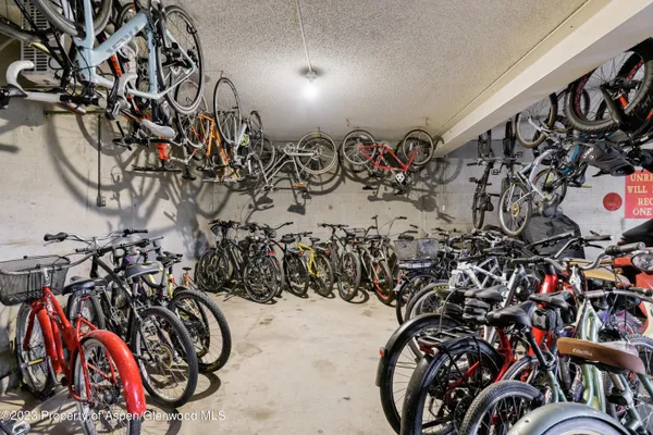 walk in a room with bicycles parked