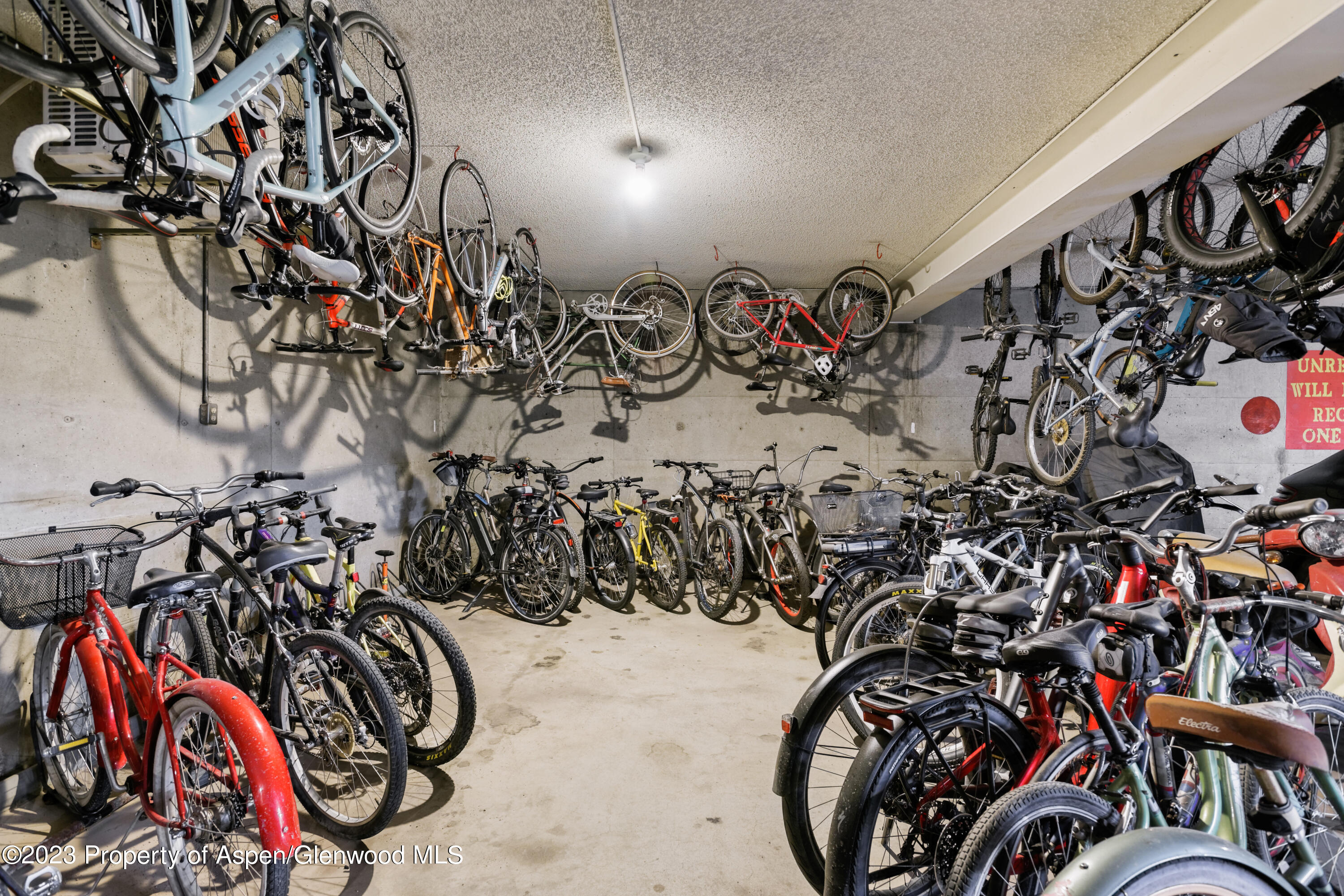 205 East Durant Avenue, Unit 3F Aspen, CO 81611 - Photo 15 of 20 walk in a room with bicycles parked
