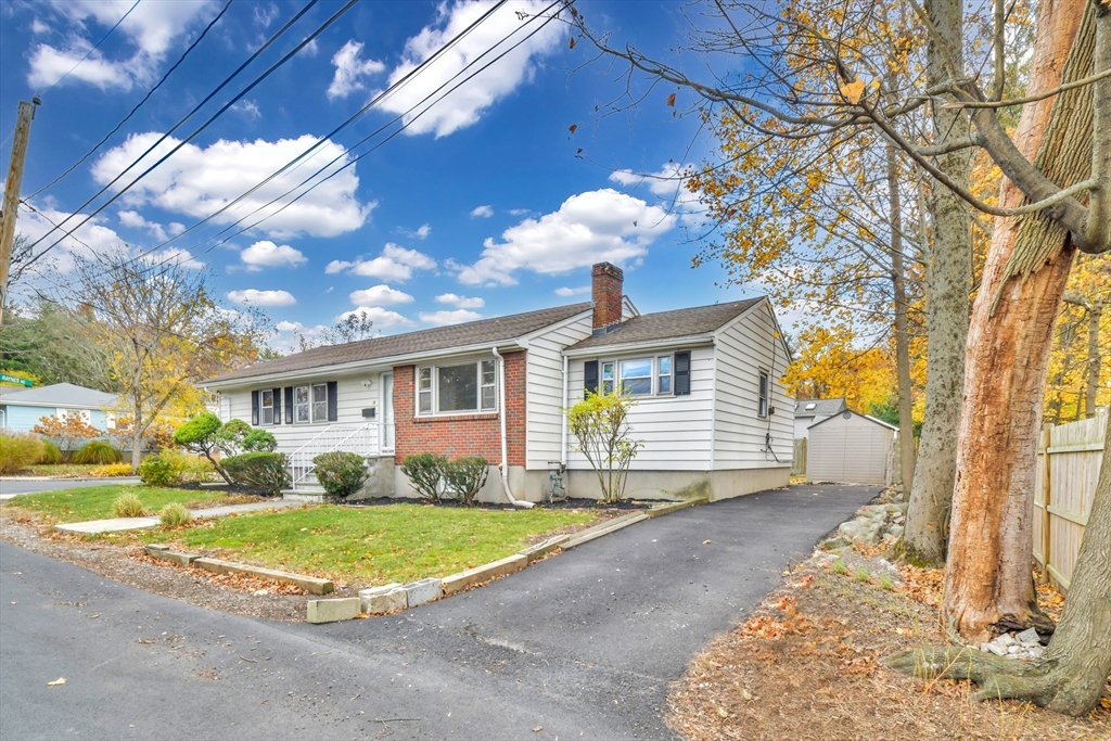16 Prospect Street Boston, MA 02136 - Photo 2 of 37 a view of a house with a big yard and large tree