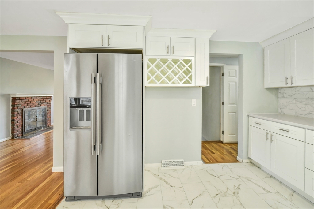 16 Prospect Street Boston, MA 02136 - Photo 25 of 37 a kitchen with stainless steel appliances a refrigerator and cabinets