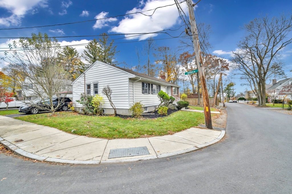 16 Prospect Street Boston, MA 02136 - Photo 3 of 37 a view of a house with a yard and garage