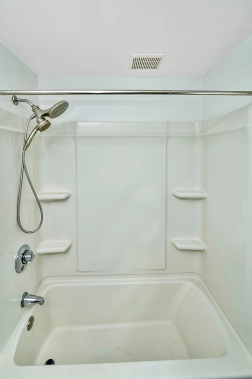 16 Prospect Street Boston, MA 02136 - Photo 35 of 37 a bathroom with a bath tub