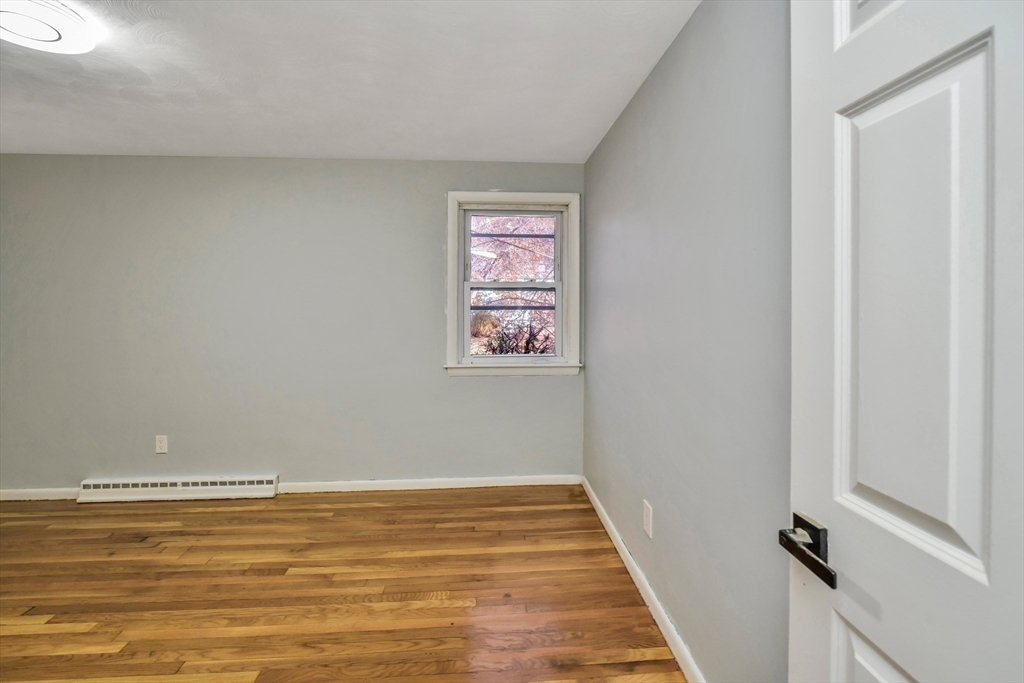 16 Prospect Street Boston, MA 02136 - Photo 10 of 37 a view of a room with wooden floor and window