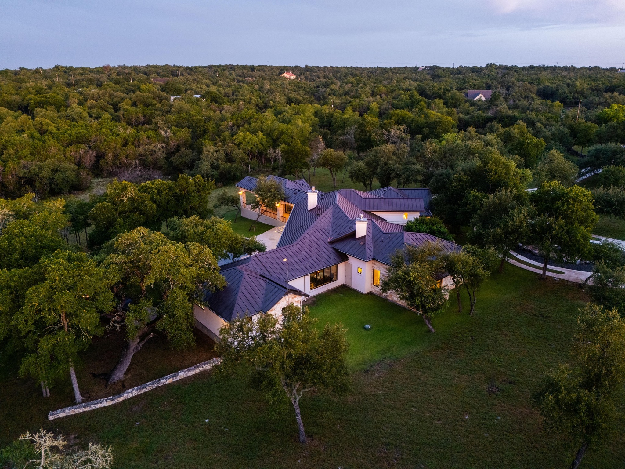 401 Trail Ridge Road Wimberley, TX 78676 - Photo 32 of 34 Aerial overview of property's location featuring a forest