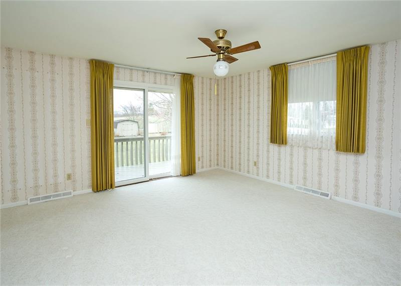 150 Crouse Road Greensburg, PA 15601 - Photo 15 of 25 SPACIOUS MASTER BEDROOM FEATURES GLASS SLIDERS WITH DECK.