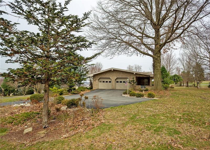 150 Crouse Road Greensburg, PA 15601 - Photo 20 of 25 STUNNING VIEWS AND MATURE TREES AND LANDSCAPING SURROUND THIS HOME. ONE ORIGINAL OWNER.