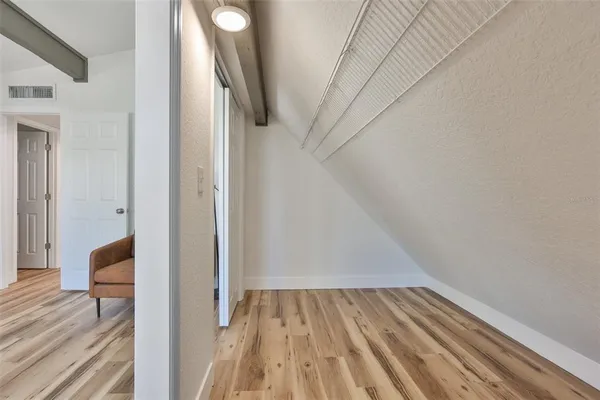 a view of livingroom with furniture and wooden floor