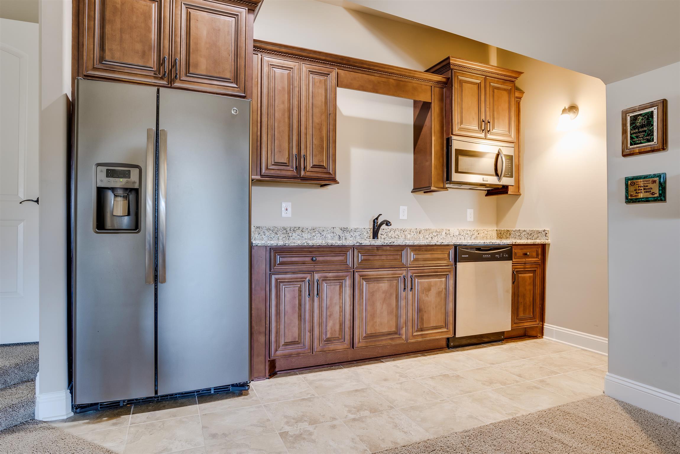 2072 Autumn Ridge Way Spring Hill, TN 37174 - Photo 27 of 30 Cabinetry, Dishwasher, Sink and full size fridge that you can put in w/ all of your snacks for Movie Night.