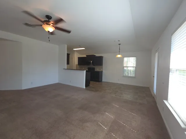 a view of a livingroom with a window