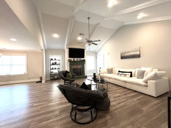 a kitchen with lots of counter top space and a window