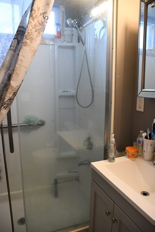 12-14 Longview Street Springfield, MA 01108 - Photo 27 of 42 a bathroom with a sink and shower