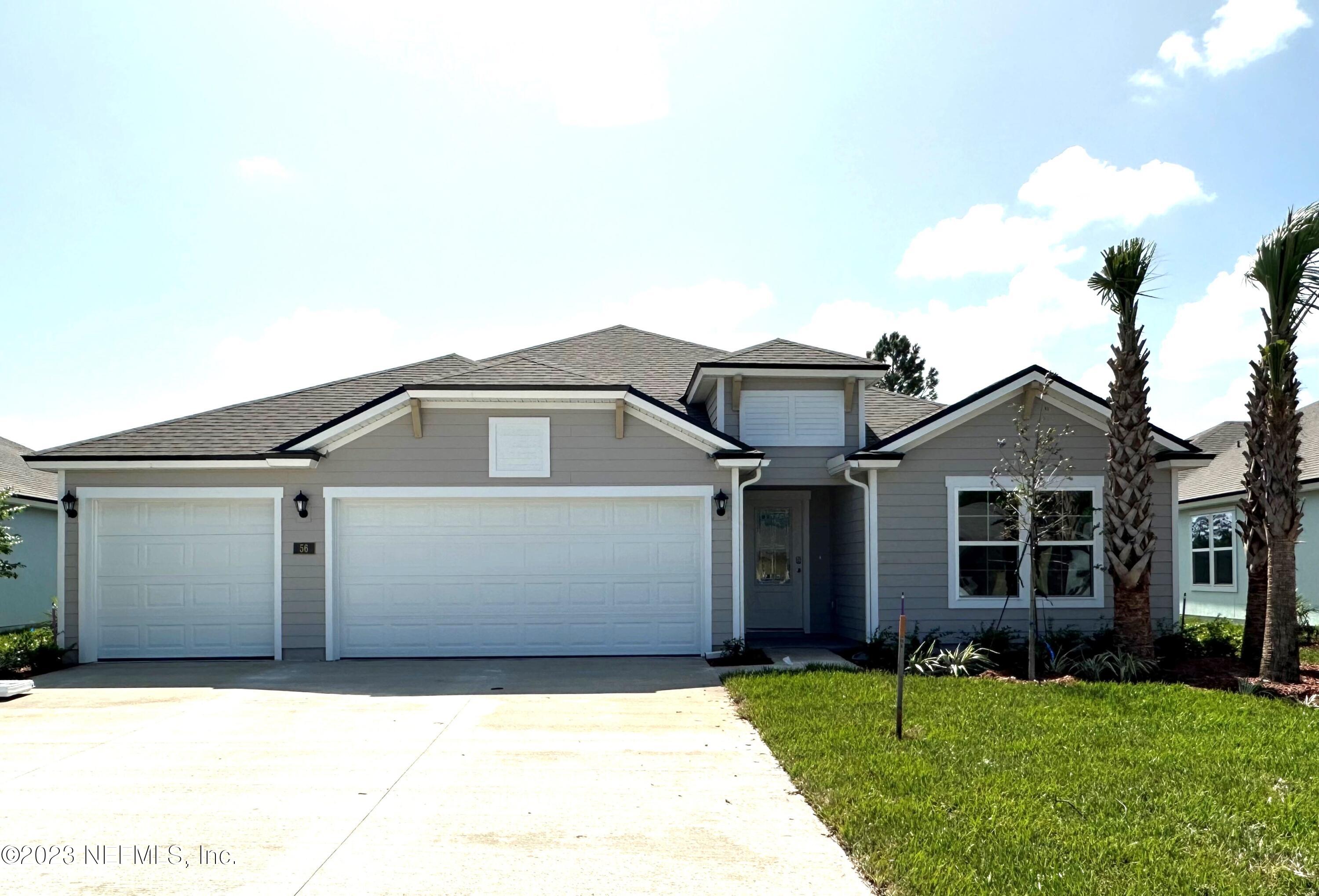 56 Hulett Wds Road Palm Coast, FL 32137 - Photo 1 of 36 Front