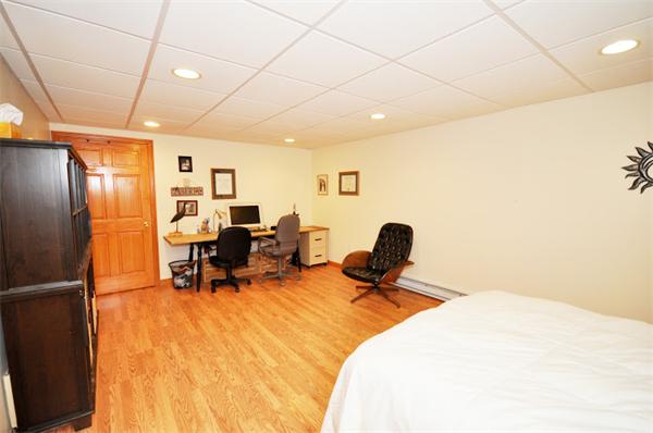 130 Stow Road Boxborough, MA 01719 - Photo 13 of 19 a bedroom with furniture and a window
