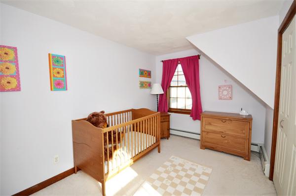 130 Stow Road Boxborough, MA 01719 - Photo 14 of 19 a bedroom with a bed and a window