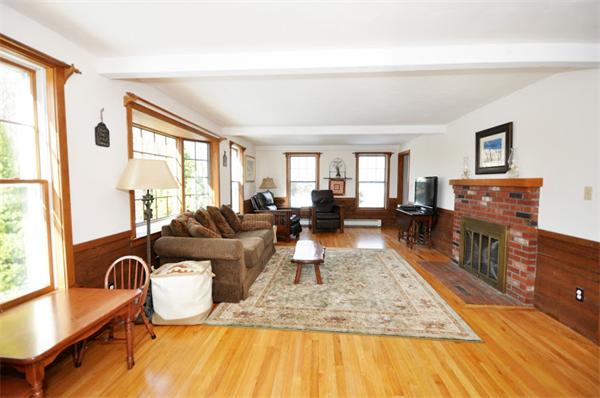 130 Stow Road Boxborough, MA 01719 - Photo 9 of 19 a living room with furniture and a wooden floor
