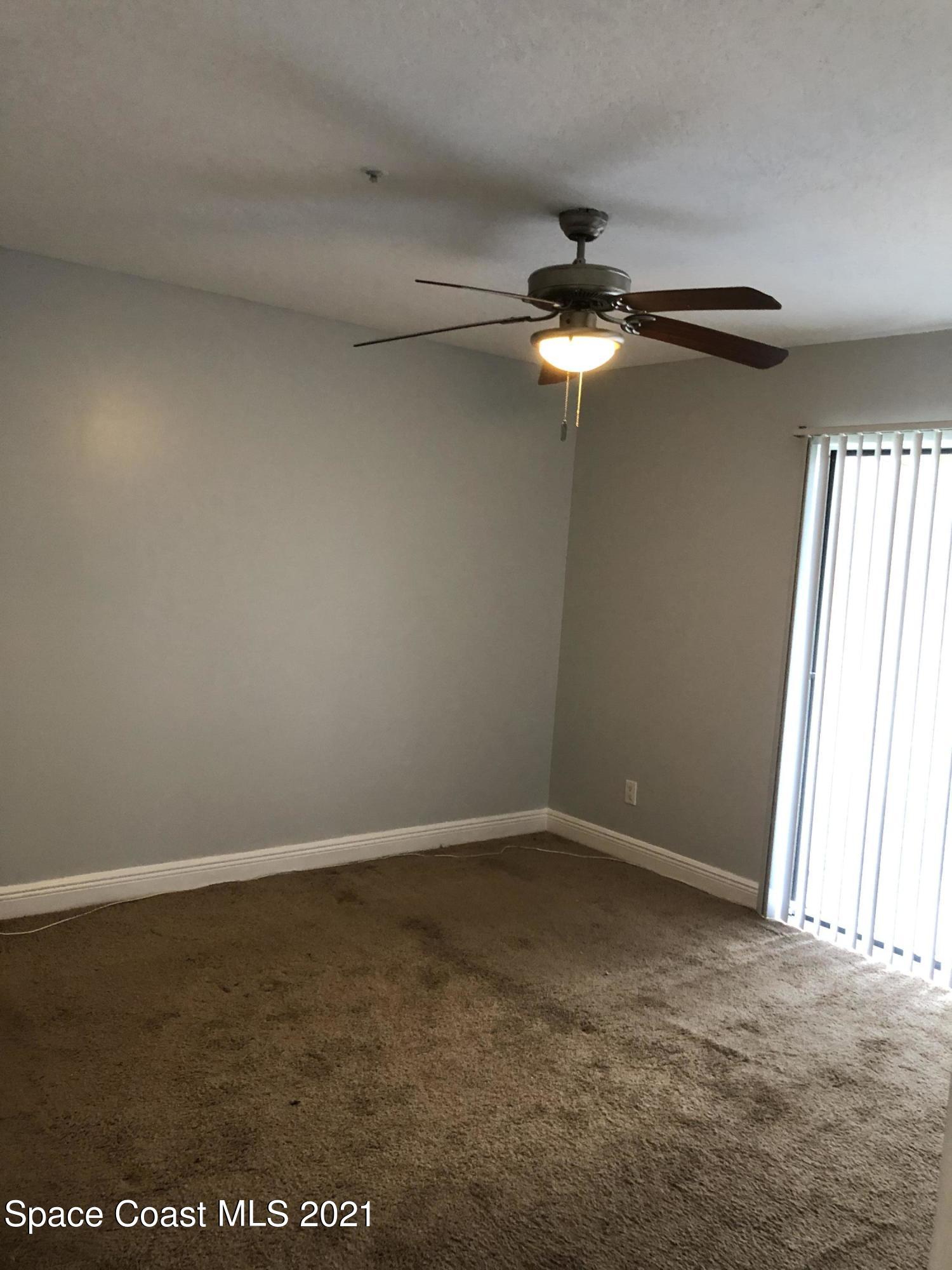 7667 North Wickham Road, Unit 406 Melbourne, FL 32940 - Photo 19 of 28 BEDROOM 1