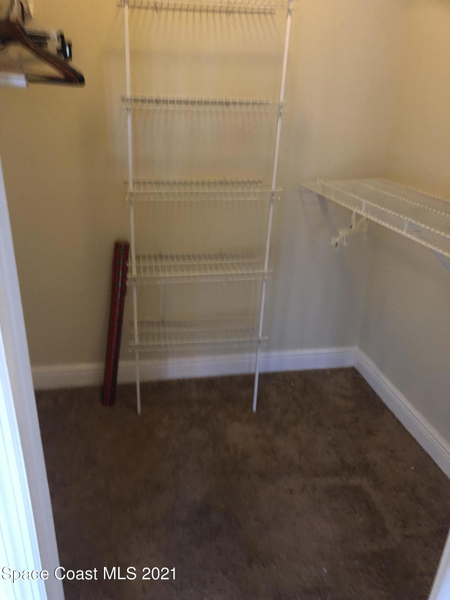 7667 North Wickham Road, Unit 406 Melbourne, FL 32940 - Photo 20 of 28 MASTER BR WALK IN