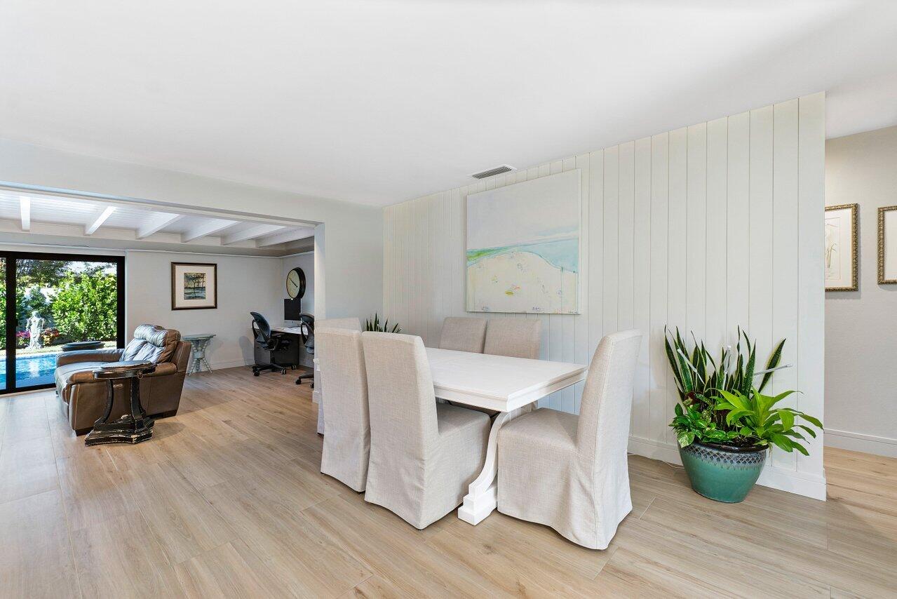 1280 Singer Drive Singer Island, FL 33404 - Photo 8 of 39 a living room with furniture and a potted plant