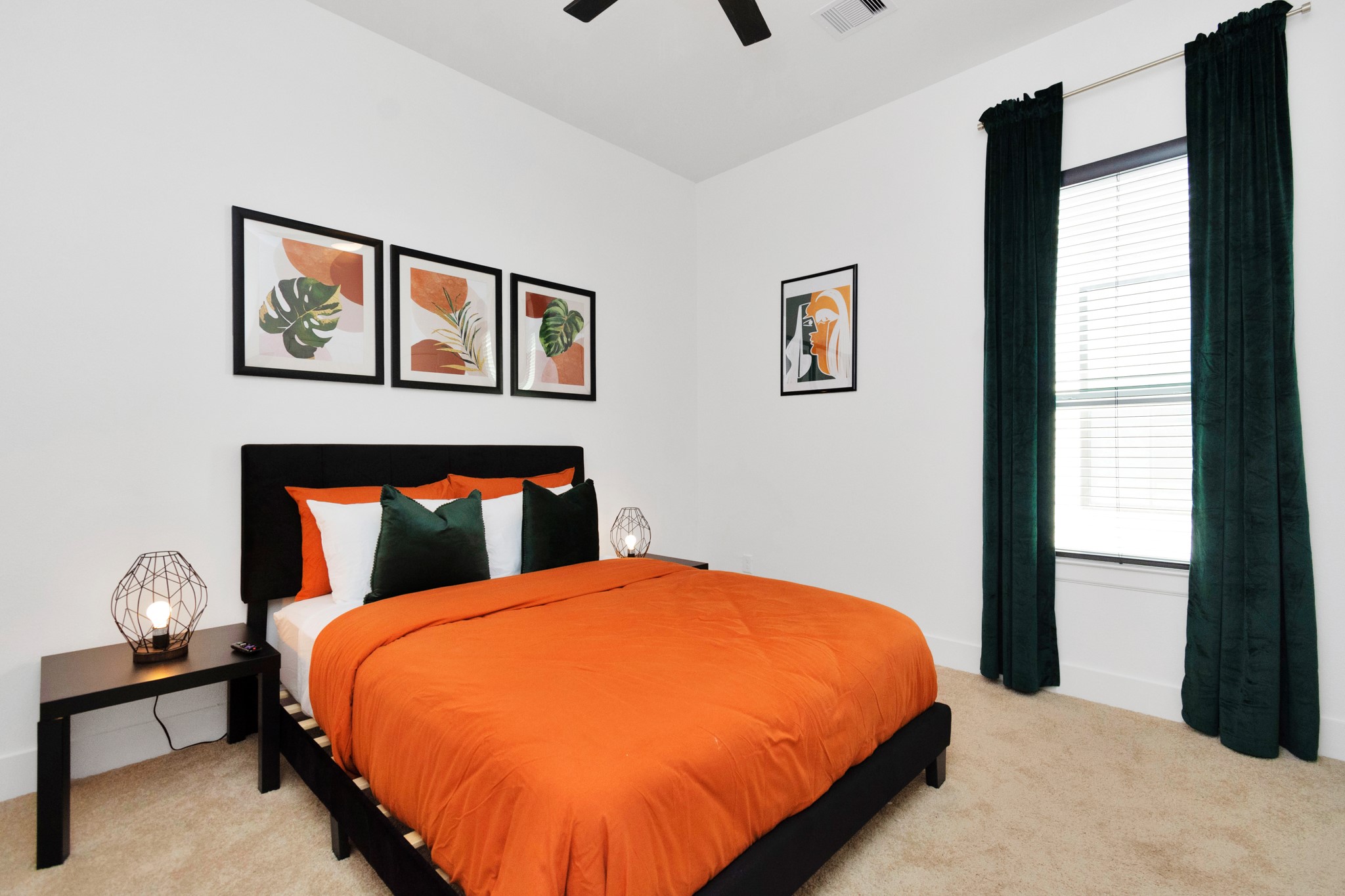 5308 Denmark Street Houston, TX 77028 - Photo 29 of 36 a bed sitting in a bedroom next to a window