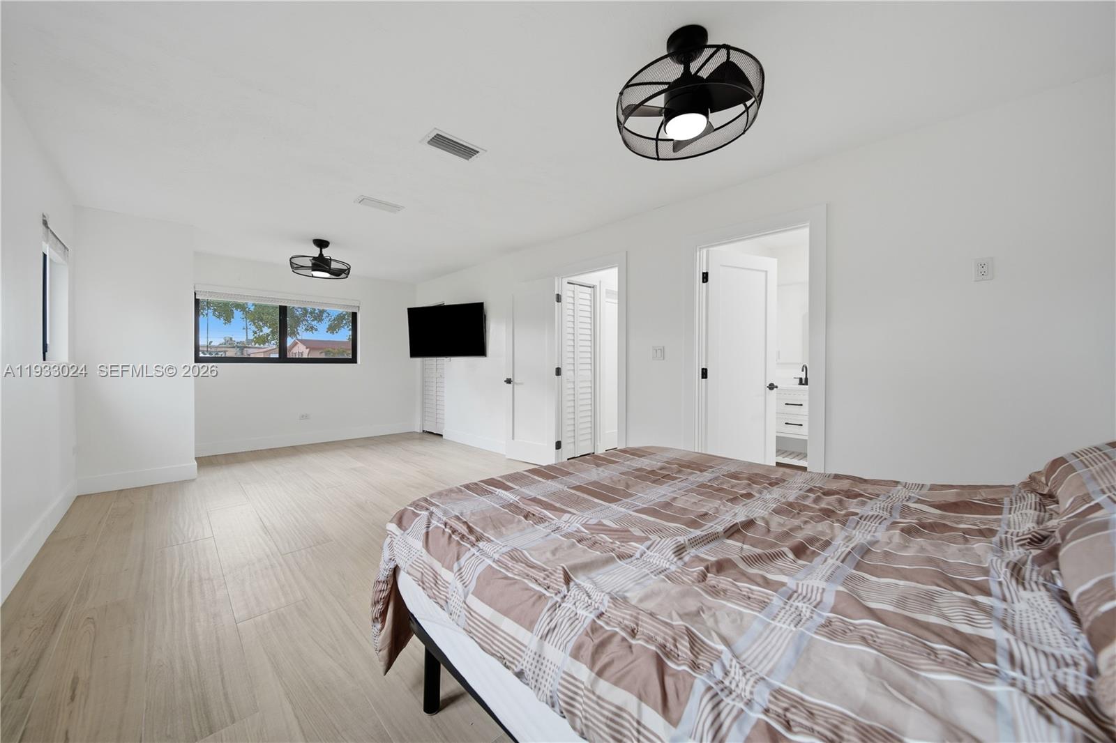 3101 Southwest 106th Avenue Miami, FL 33165 - Photo 12 of 29 These are two bedooms combined. Needing a wall and closet to be made to separate.