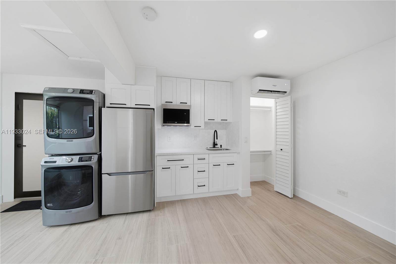 3101 Southwest 106th Avenue Miami, FL 33165 - Photo 20 of 29 The French door to the back was added virtually before the new clear glass one was installed.
