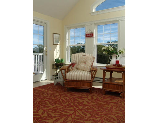 a living room with furniture and a gate