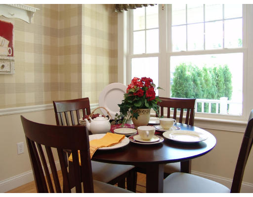 7 Primmett Lane, Unit 7 Worcester, MA 01609 - Photo 3 of 10 a view of a dining room with furniture window and outside view