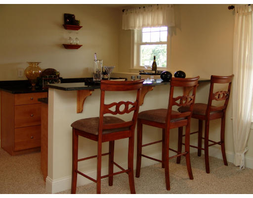 7 Primmett Lane, Unit 7 Worcester, MA 01609 - Photo 4 of 10 a view of a dining room with furniture and window
