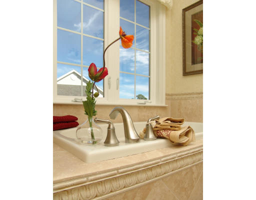 7 Primmett Lane, Unit 7 Worcester, MA 01609 - Photo 10 of 10 a bathroom with a sink and a mirror