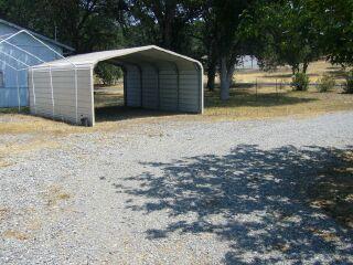 16872 Stagecoach Road Corning, CA 96021 - Photo 2 of 8 a front view of a house with a yard