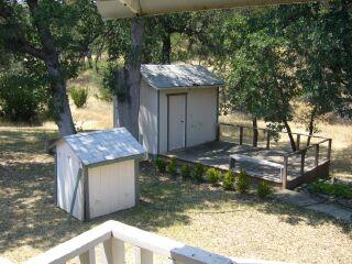 16872 Stagecoach Road Corning, CA 96021 - Photo 6 of 8 a view of a wooden door of the house
