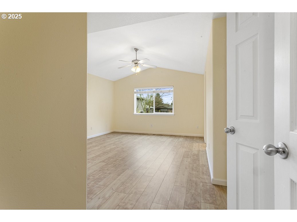 1575 Southeast Dexter Lane Gresham, OR 97080 - Photo 24 of 48 a view of an empty room and a window