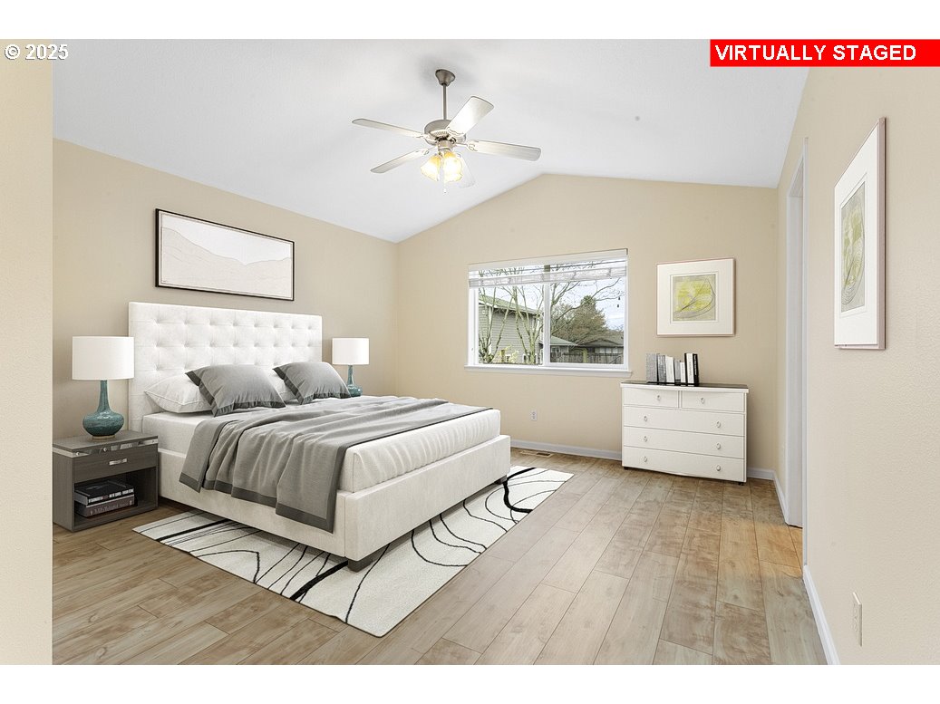 1575 Southeast Dexter Lane Gresham, OR 97080 - Photo 25 of 48 a bedroom with a large bed and a window