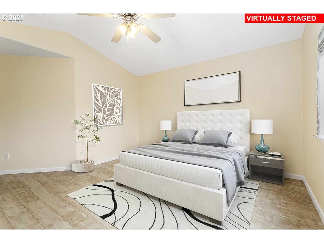 1575 Southeast Dexter Lane Gresham, OR 97080 - Photo 31 of 48 a bedroom with a bed and a chandelier