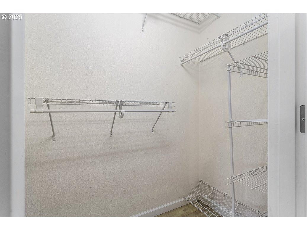 1575 Southeast Dexter Lane Gresham, OR 97080 - Photo 33 of 48 a view of a room with racks on the wall