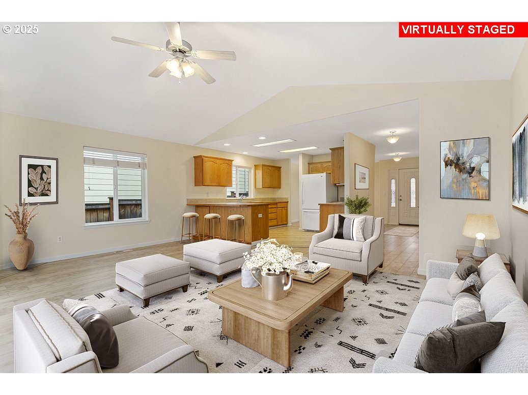 1575 Southeast Dexter Lane Gresham, OR 97080 - Photo 7 of 48 a living room with furniture and a chandelier