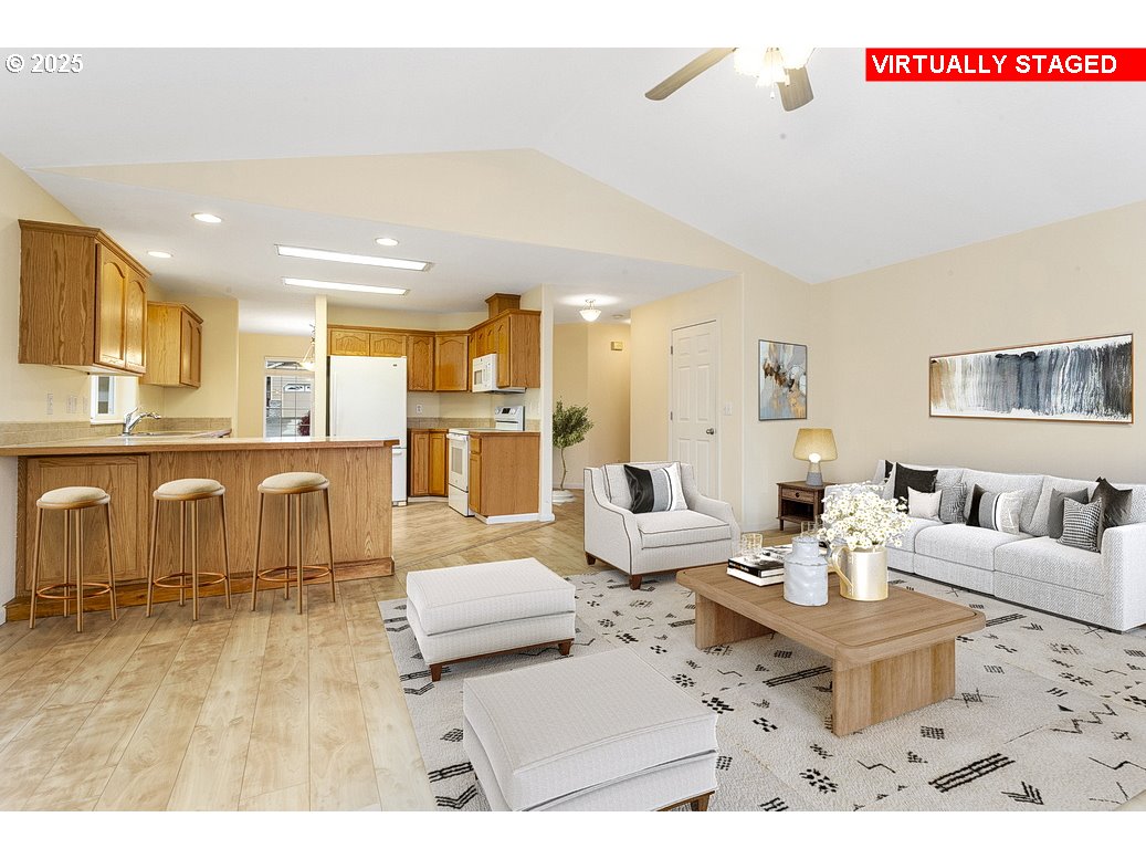 1575 Southeast Dexter Lane Gresham, OR 97080 - Photo 9 of 48 a living room with lots of furniture and a table