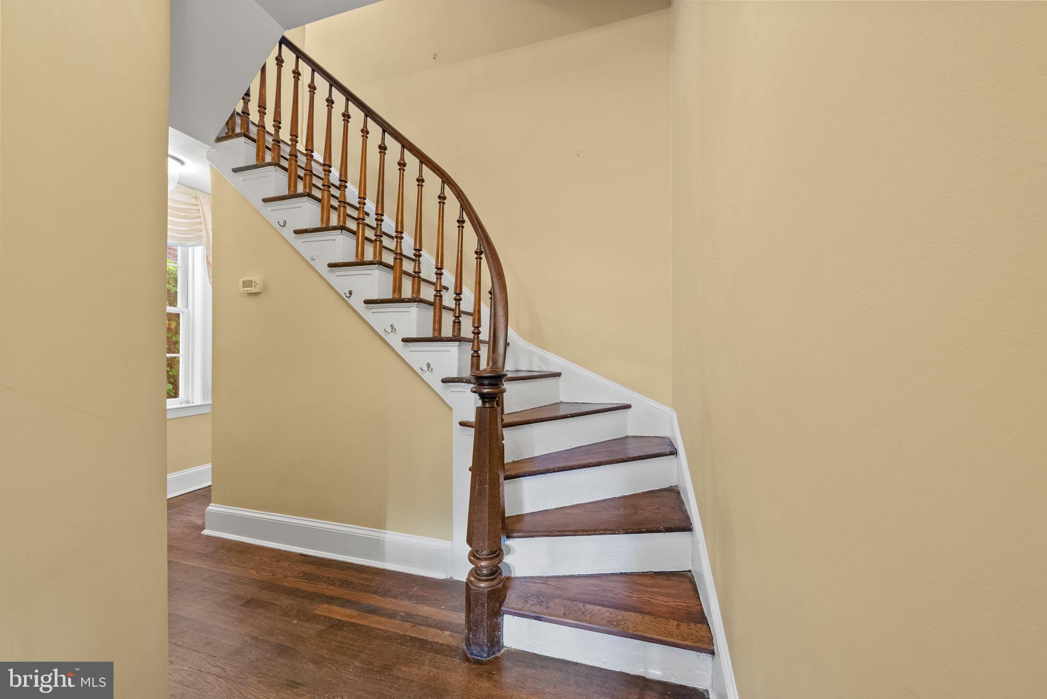 128 11th Street Southeast Washington, DC 20003 - Photo 6 of 52 Curved staircase