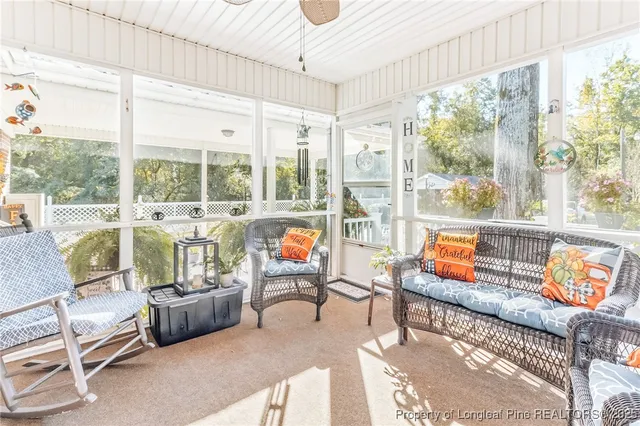 a view of a chairs and tables in the patio