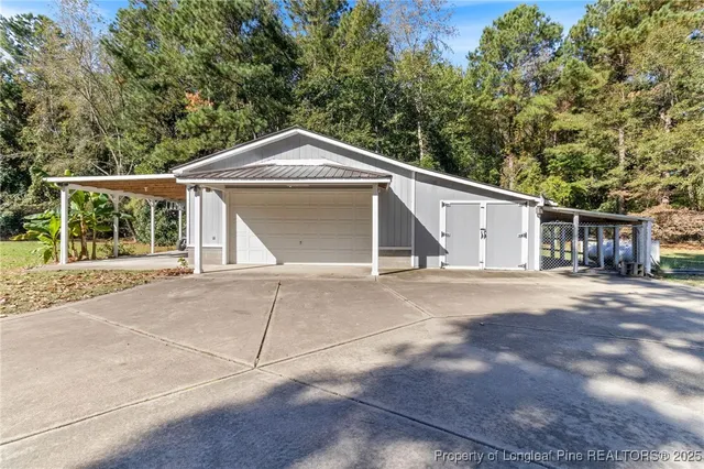 a view of a house with a snow in the yard